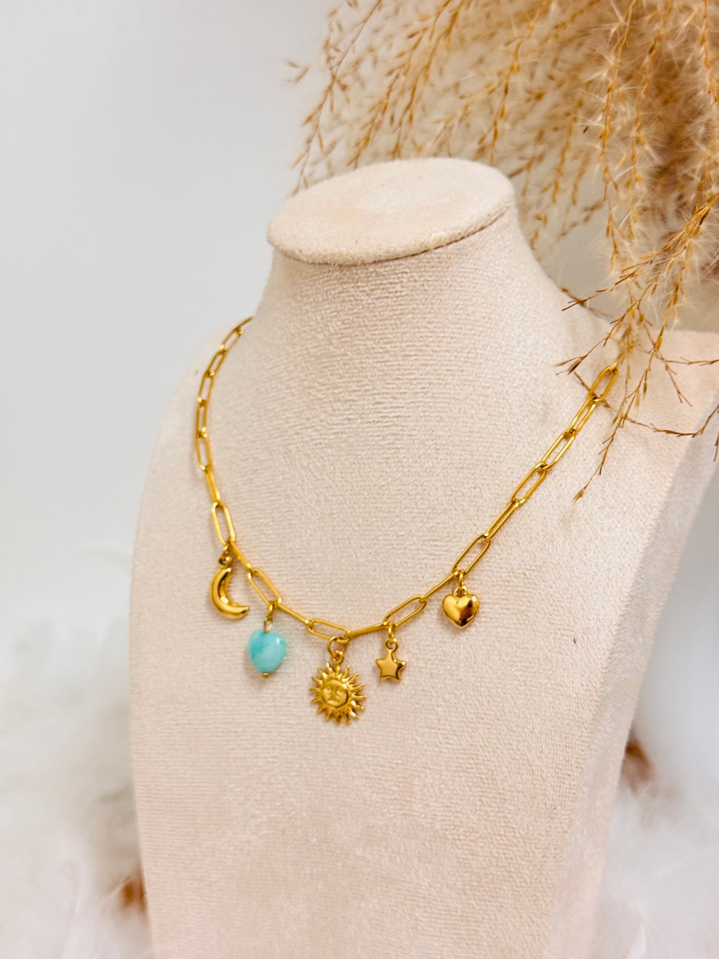 Collier breloques soleil coeur