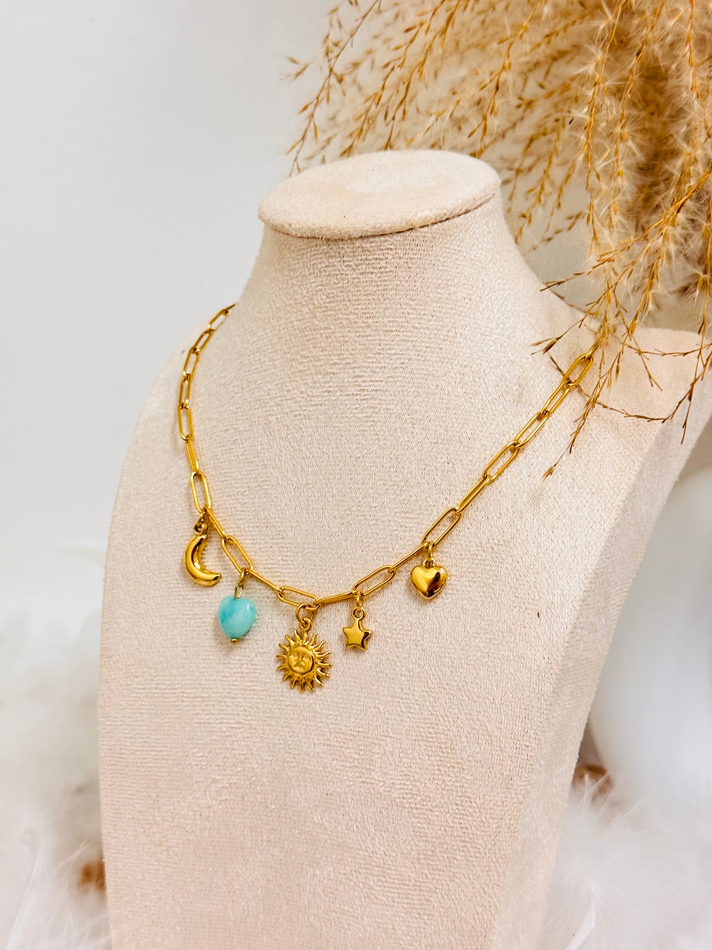 Collier breloques soleil coeur