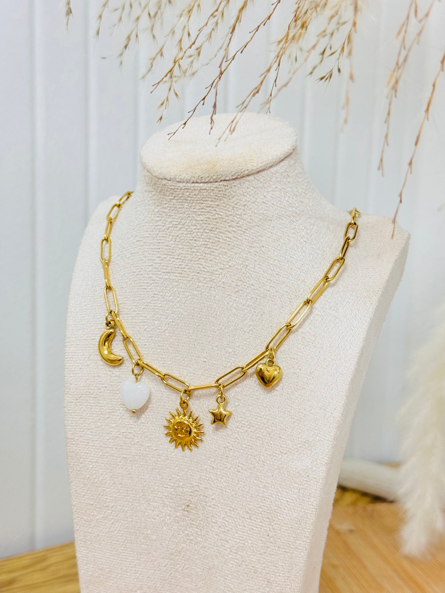 Collier breloques soleil coeur