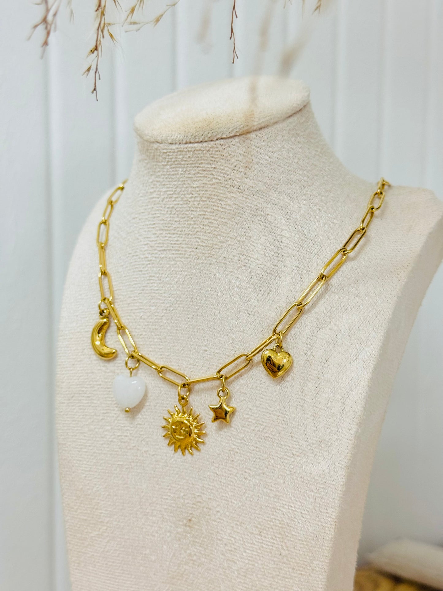 Collier breloques soleil coeur