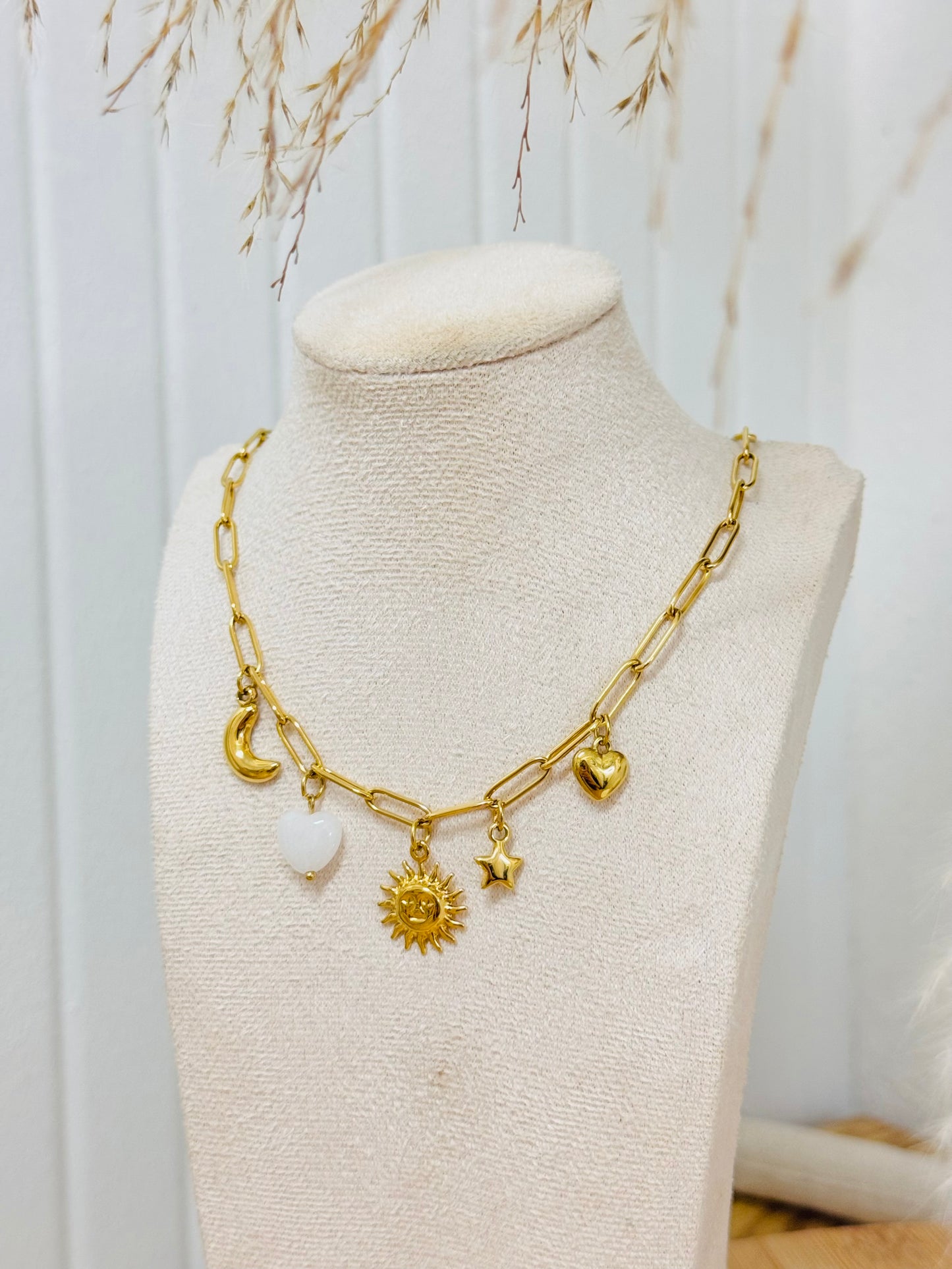 Collier breloques soleil coeur
