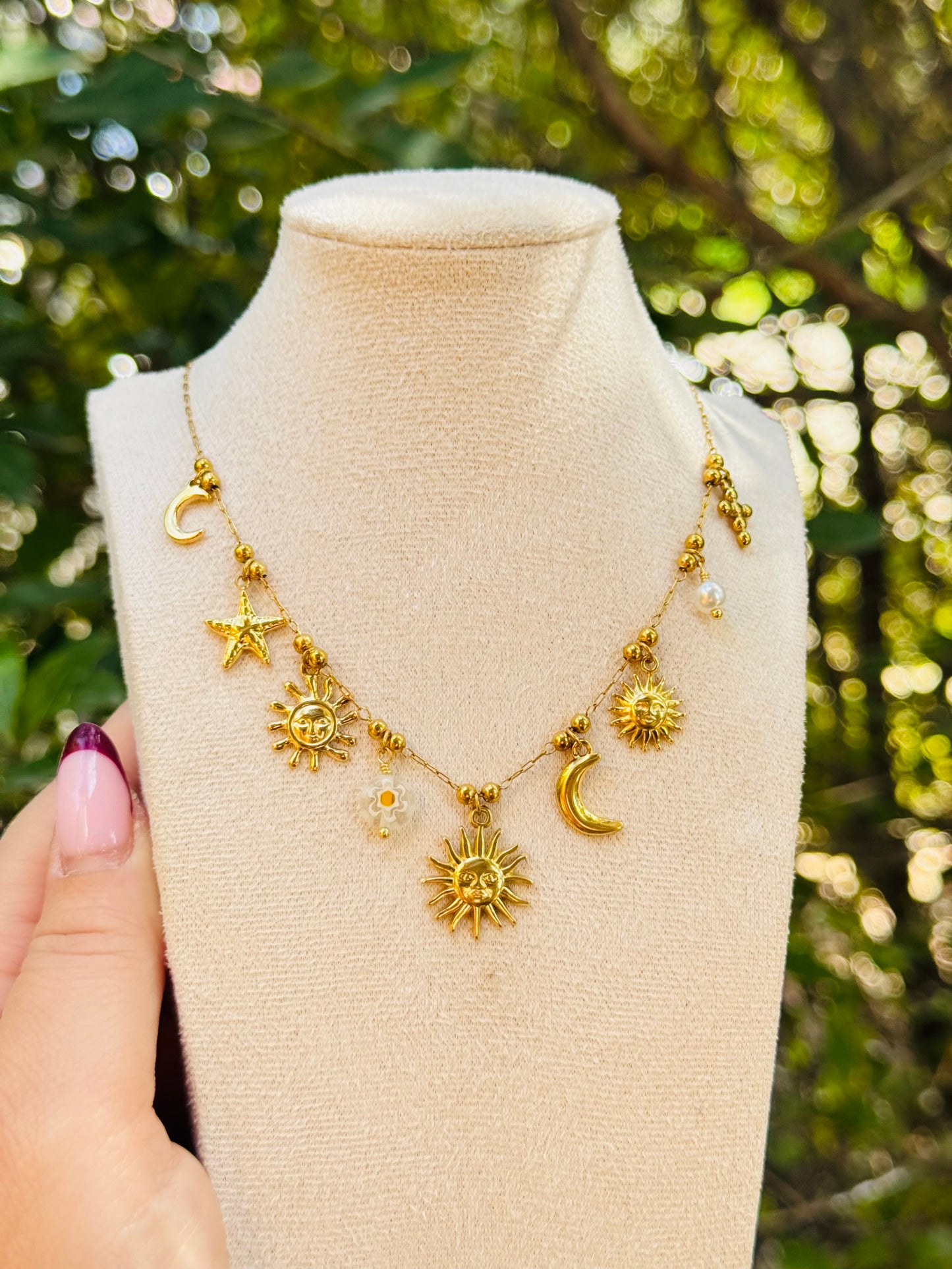 Collier breloques soleils